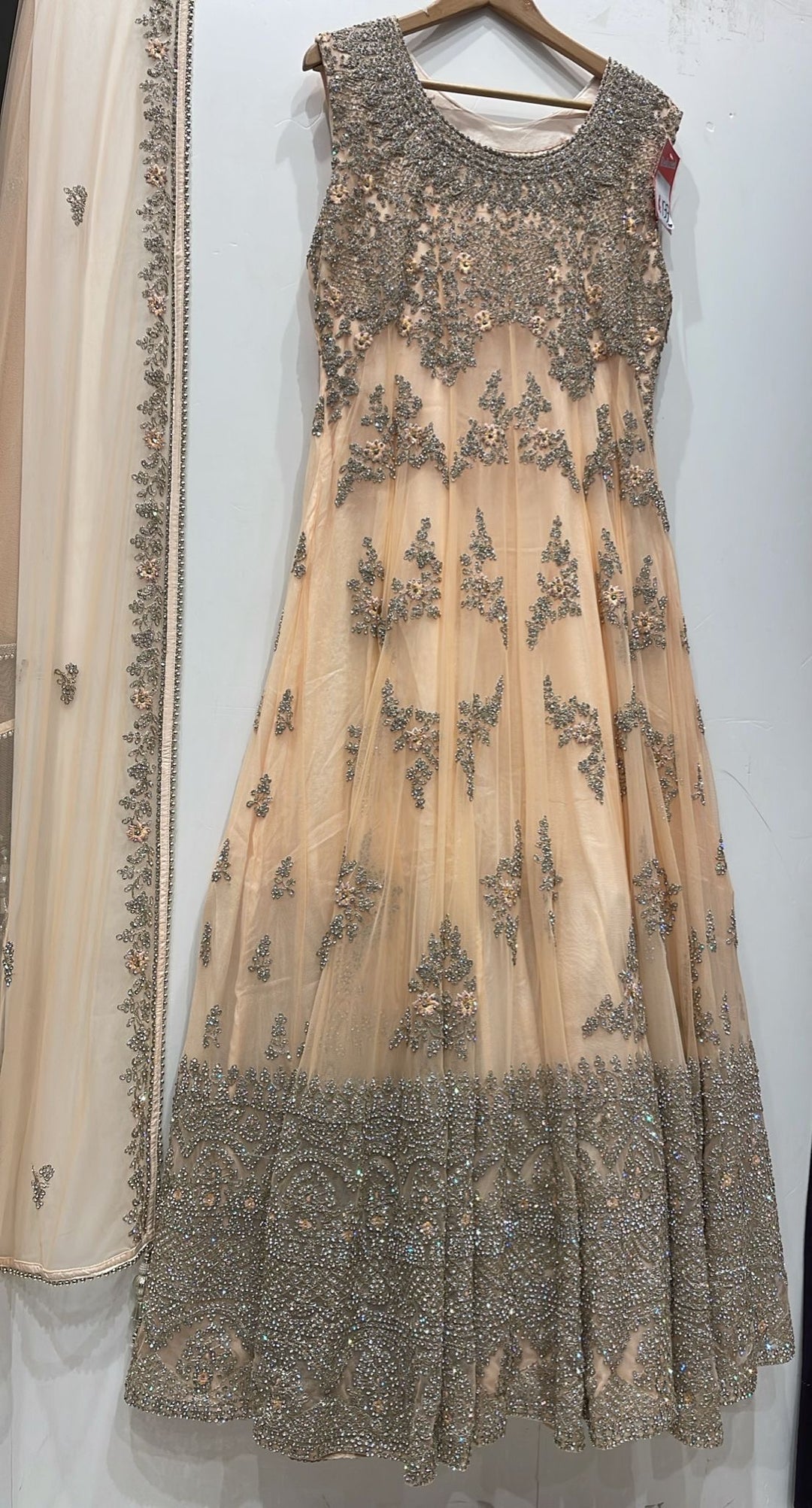 7015C- Light Peach Embroidered & Embellished net long dress